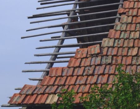 Roof destroyed that needs replacement by Professional